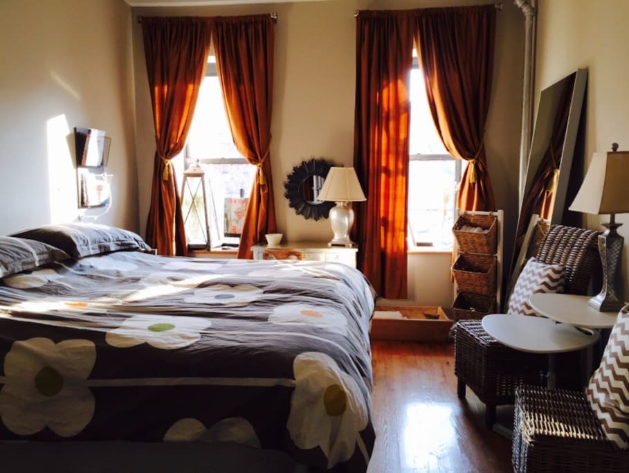In Winter a warm sunny heated large Master Bedroom with huge King Size Bed, Blankets and Comforter that allows for indulgent sprawling and total relaxation after a busy day in NYC. Thick-lined drapes for privacy.