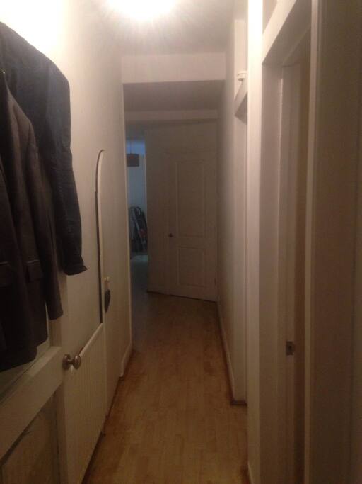 Hall with a wardrobe and other storage