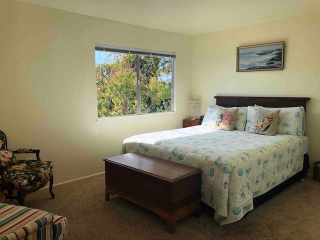 Relaxing California King Bedroom with Garden View
