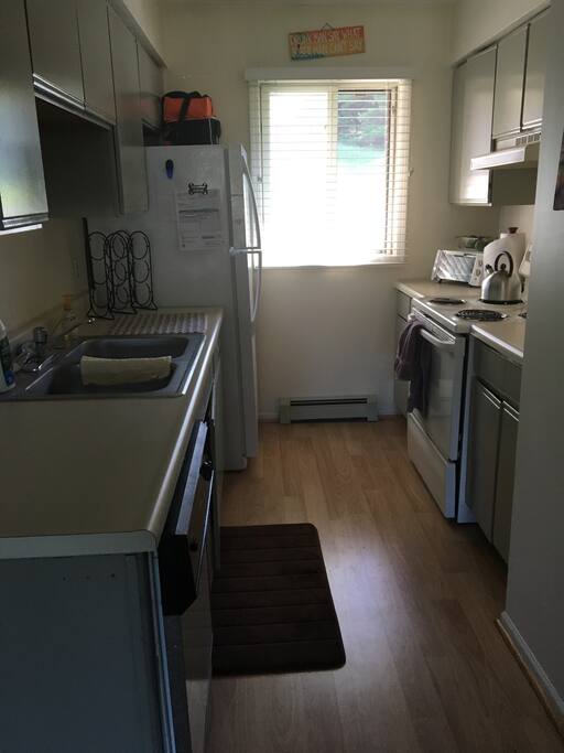 Full kitchen with dishwasher. Enjoy a home cooked meal, or eat out and have a place for left overs.