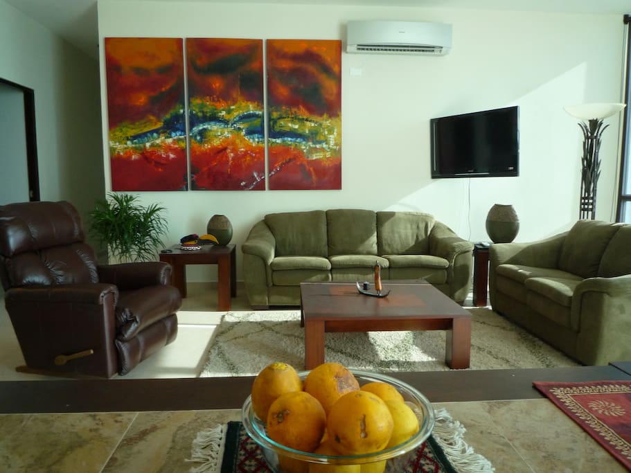 living room, local art, high ceilings, ocean views