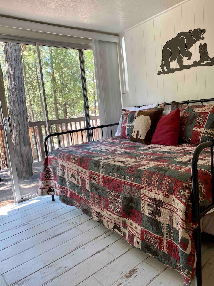 The bunk room has its own sliding glass doors out to the deck. 