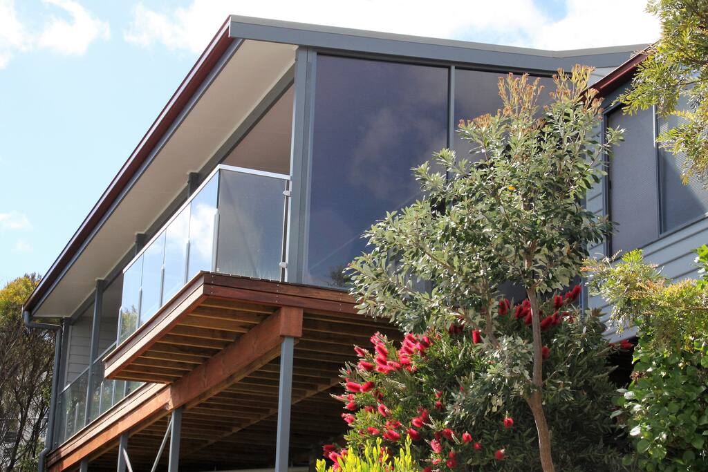 Looking up at Sea Eagle Cottage from the path down to the beach and restaurant