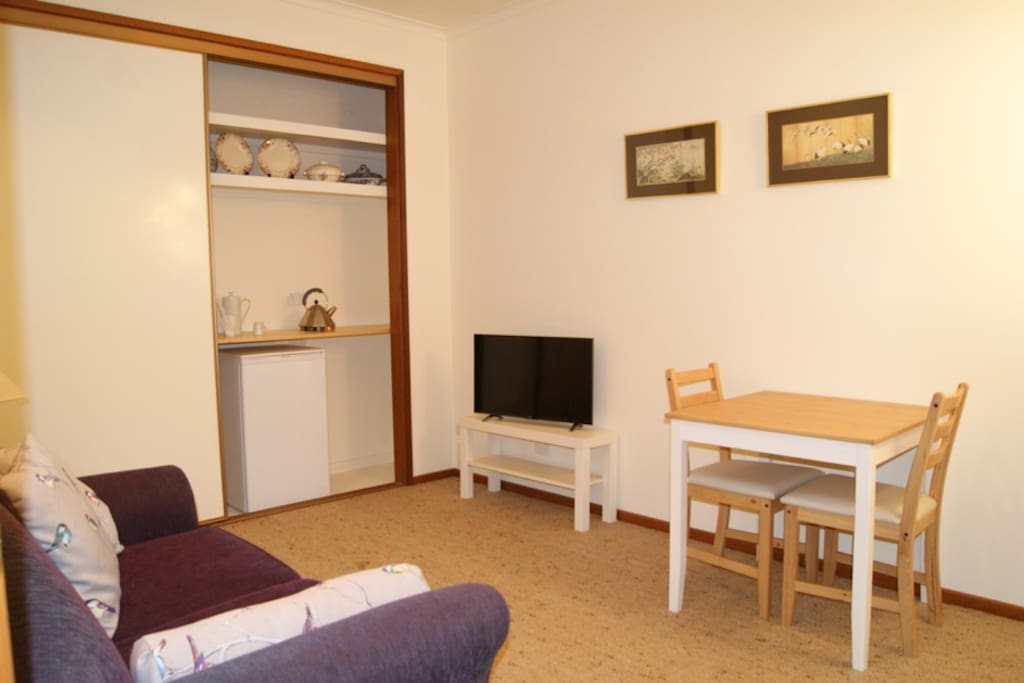 Private sitting room with TV