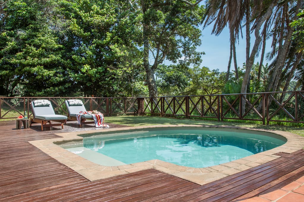 Enjoy the sunny tropical weather lazing around your own private swimming pool
