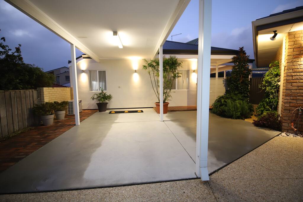 Front of house, carport and car space