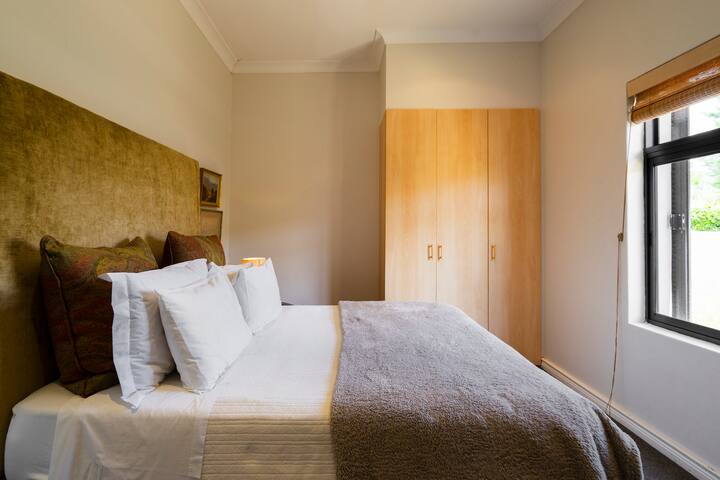 Spare room with queen bed