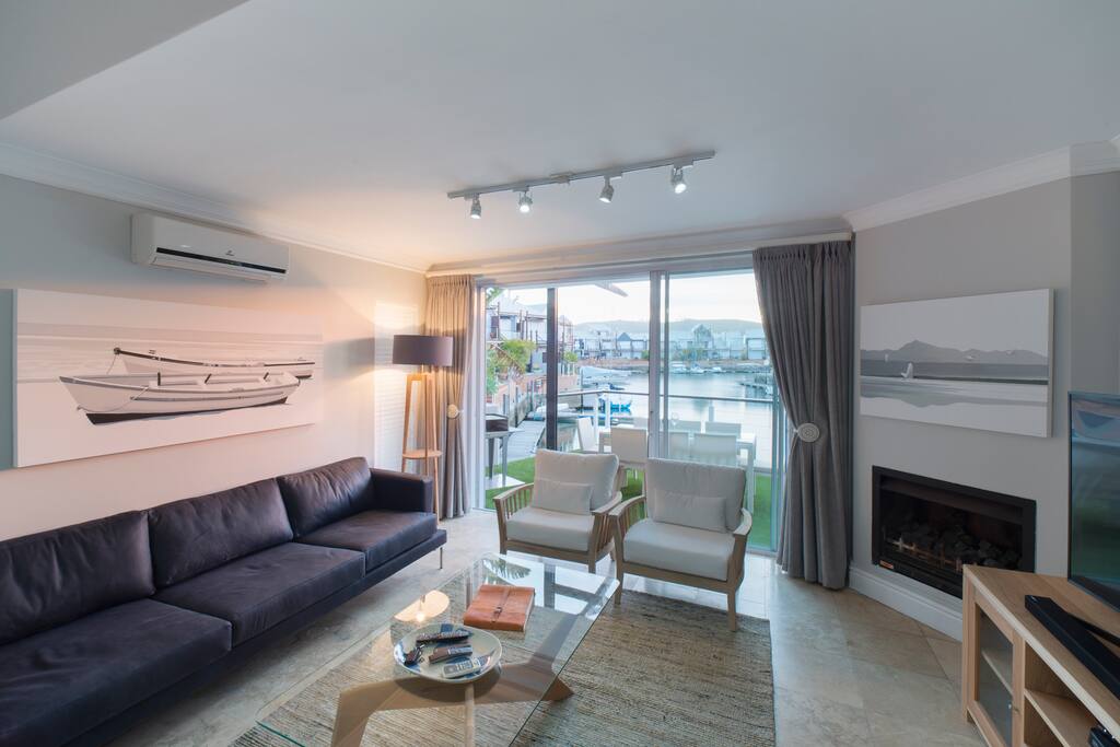TV includes DSTV explorer HD with full package, with sofa and two chairs.
Gas fireplace