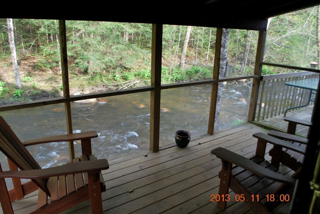 Sit on the porch and enjoy the sights and sounds of the creek