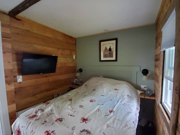 bedroom 1 with tv 
****Please note: bedding and linens are NOT included, guests must bring their own