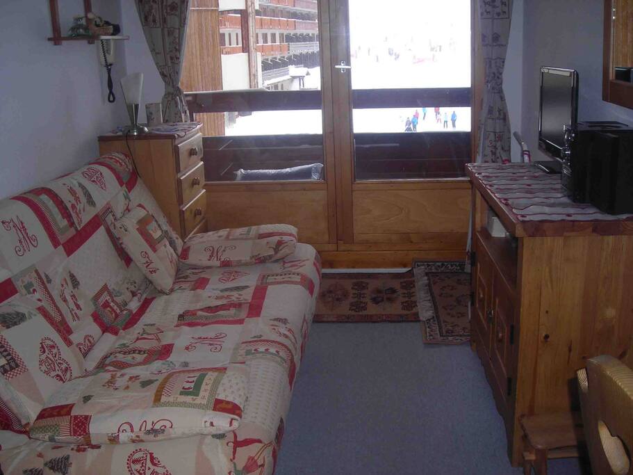Le séjour ouvrant sur balcon