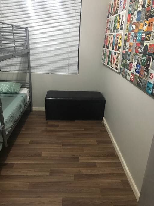 Second bedroom with twin single beds and folding bed (double size)
