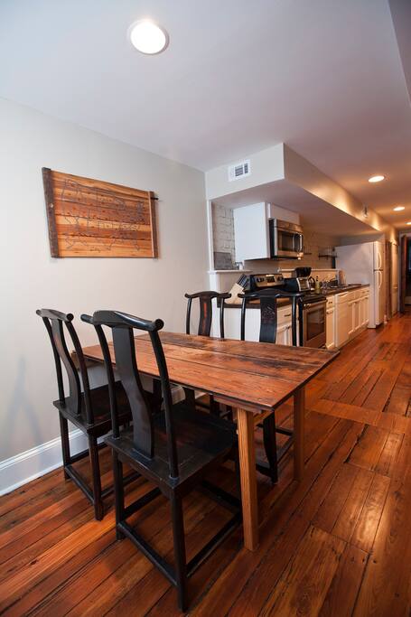"Murphy Style" dining table folds up to the wall if you need more space.