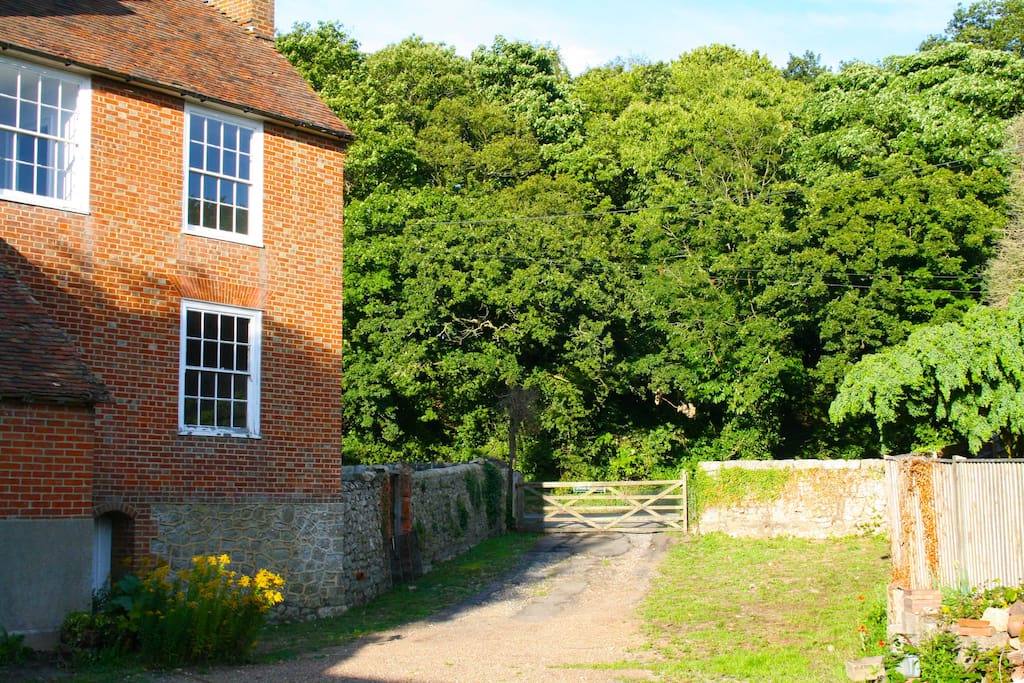 The farmyard offers parking for two cars (more on request) and the gate can be locked for security. Please park side by side on the grass on the right here.
