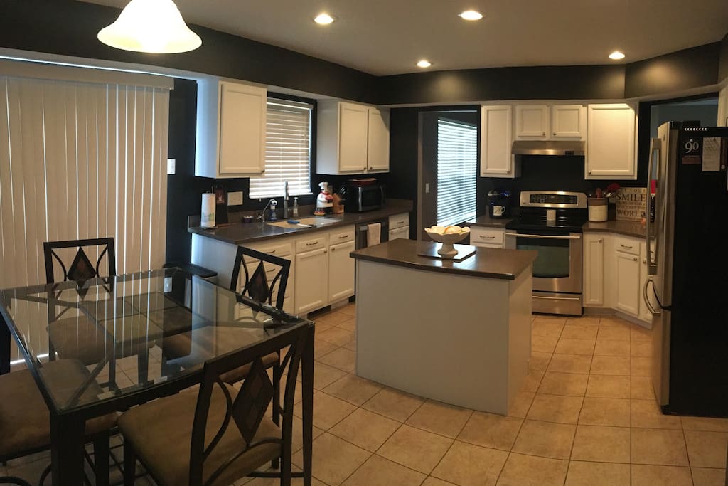 Kitchen table seats 4 and has access to to deck/patio.