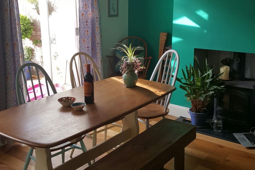Dining space with doors to the garden. Log burner for cosy winter evenings.