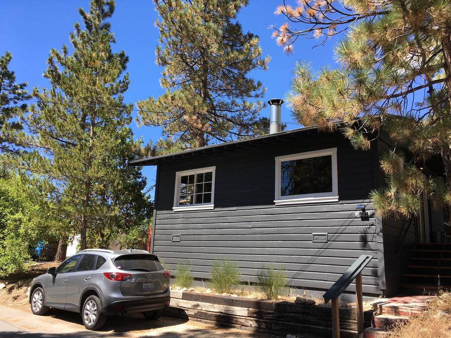 Our place has ample room for one car, or two small ones - consider carpooling, that's hygge, too!