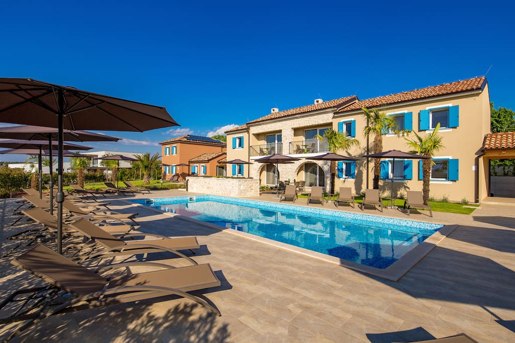 Spacious sun deck with pool