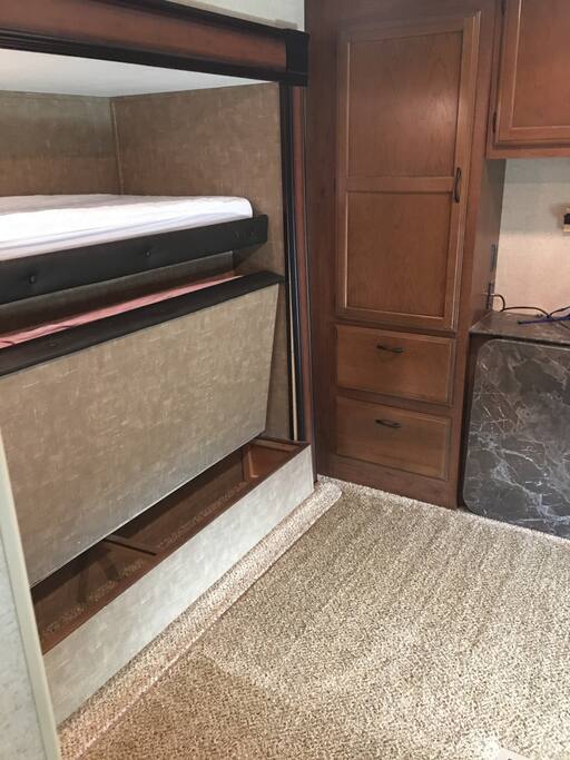 Bunkhouse bedroom. Bottom bunk folds down.