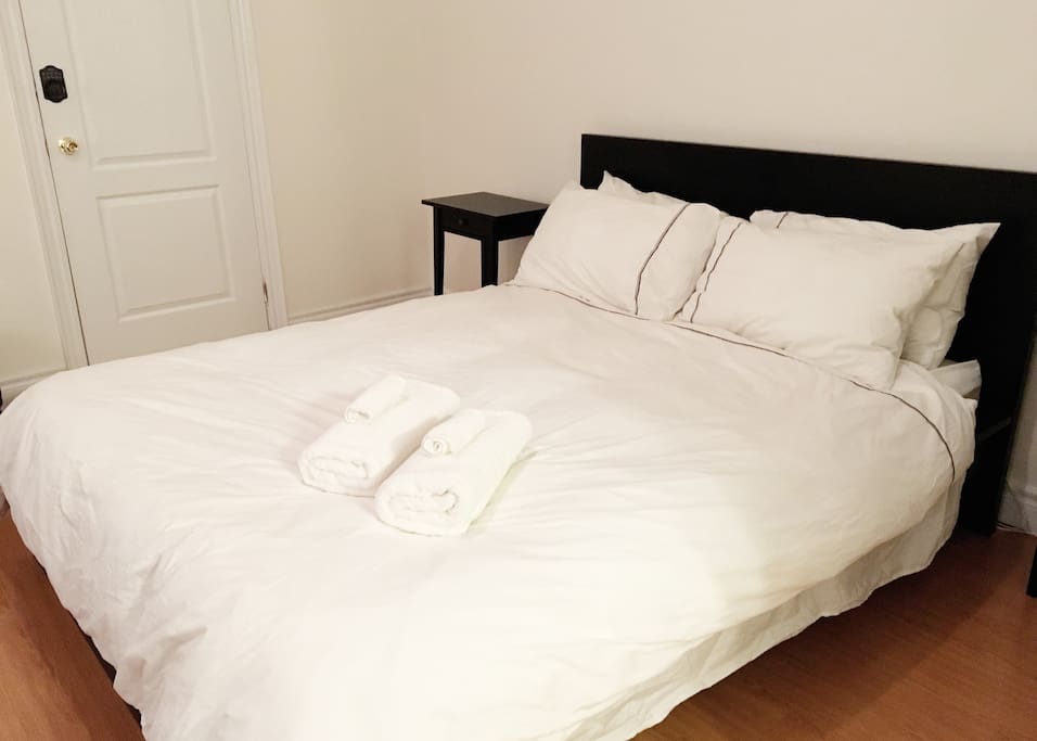 Queen size bed - great mattress! Fresh, white linens and towels included (body towels and face towels)