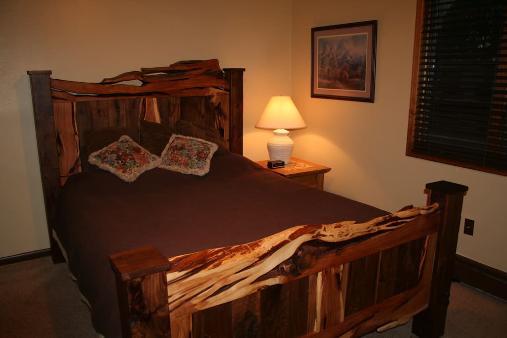 Comfortable Queen size bed in beautiful Juniper / Walnut bedframe.