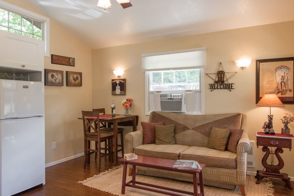 Quant & cozy living room/dining room combo.