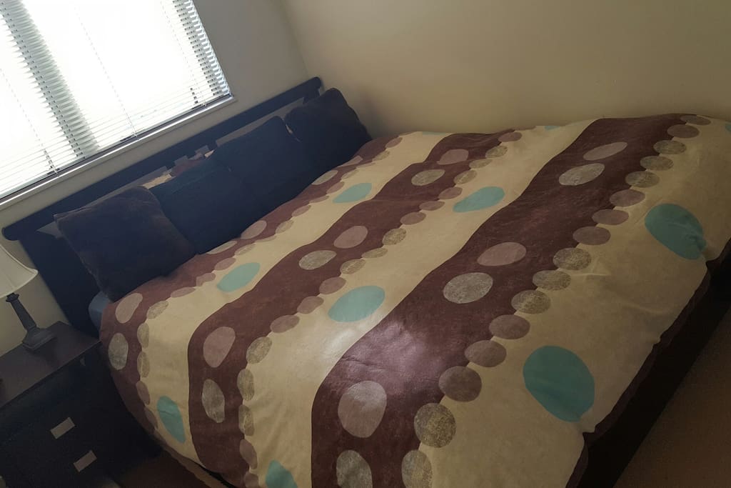 Double bed, side lamp and side draw