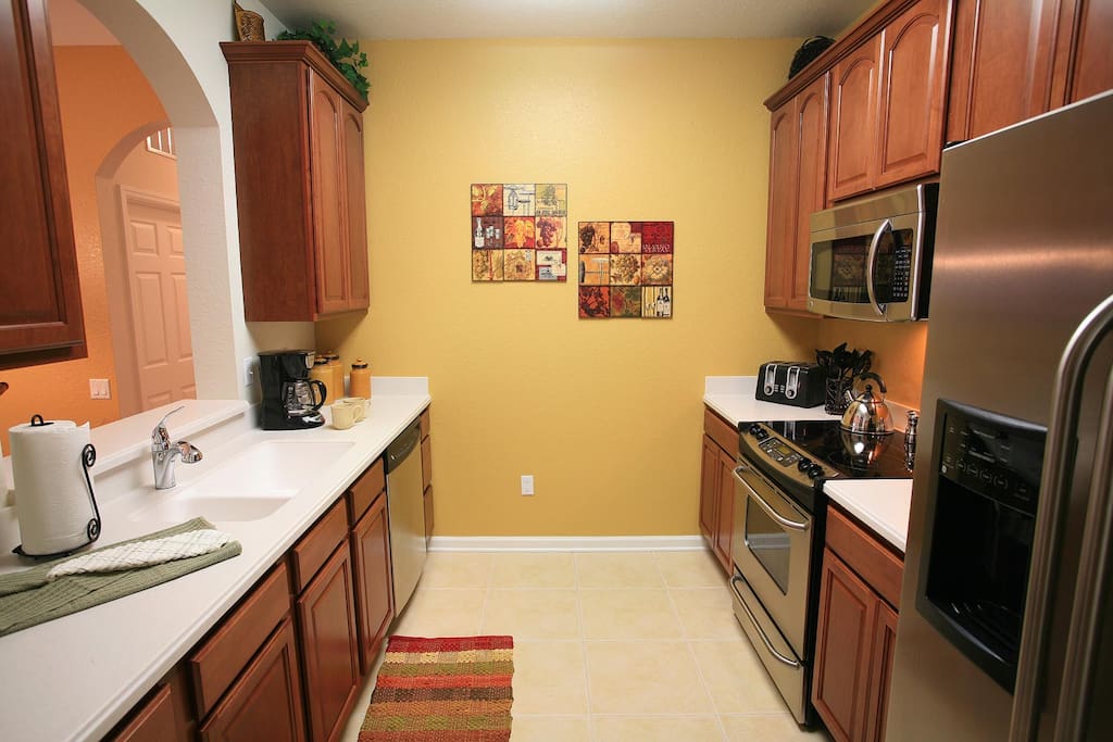 Fully equipped kitchen with stainless steel appliances
