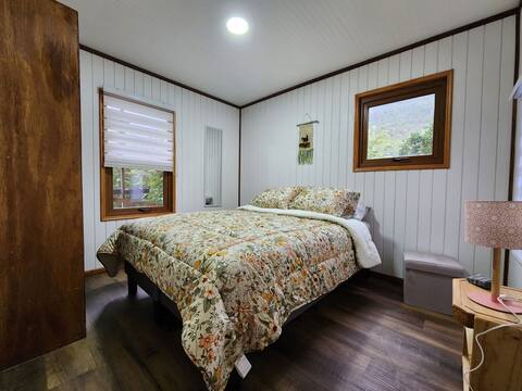 Room with a full bed.