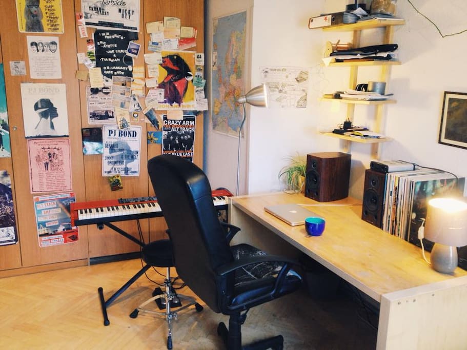A large, clear desk to work at, and office chair.