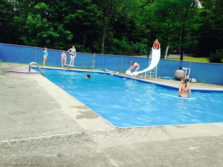 pool with diving board and slide, 3 1/2 foot shallow end 8 1/2 foot deep end