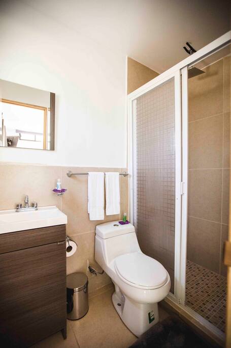 Well appointed bathroom with all the necessary amenities.
