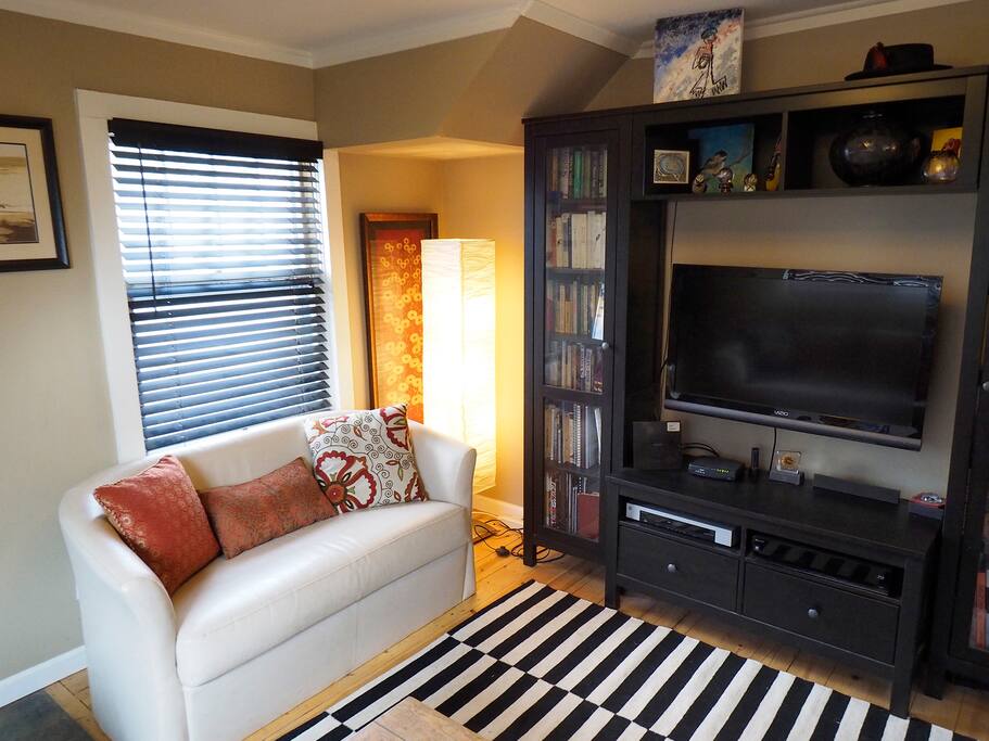 Downstairs living area: 40" TV, DVD, CD. Books and CD library