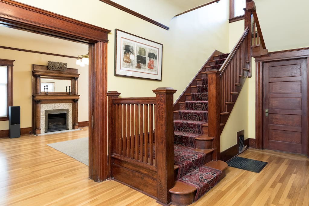 Straight ahead as you enter, you are greeted by classic steps leading to the bedrooms upstairs, with the living room on the left ...