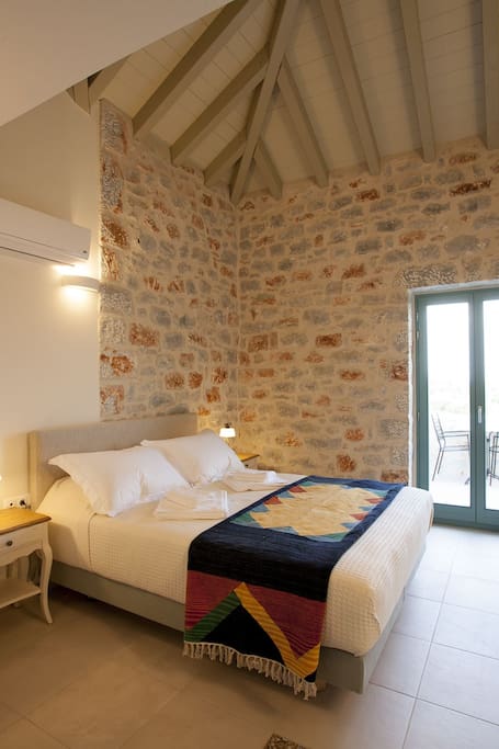 The exposed stone walls give the studios a traditional feel.