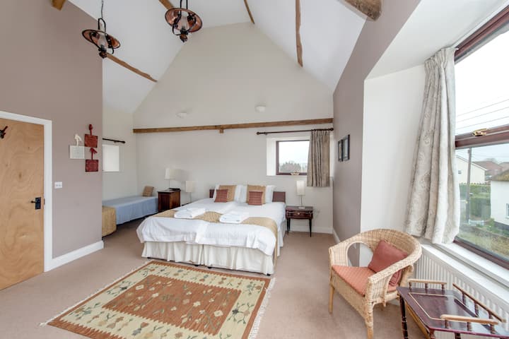 Exposed beams, but modern, light and airy