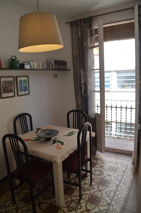 Dinning room with balcony and original tile