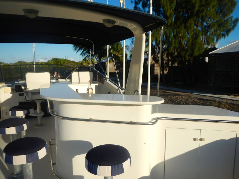 The top deck with a custom wet bar.