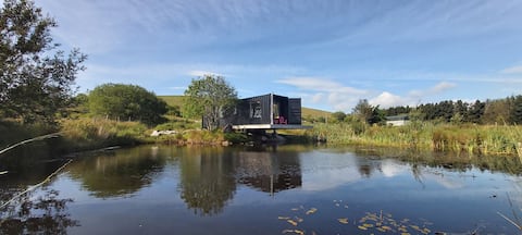 NEW - SHIPPING CONTAINER Home on Coastal Lake -WOW