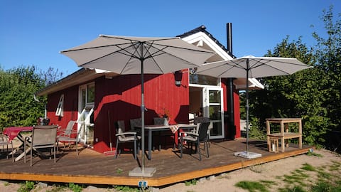 The Baltic Sea hut - red Swedish house on the Baltic Sea
