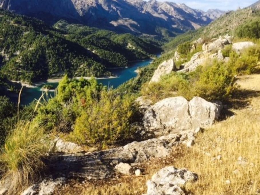 The one-acre garden looks over the lake and mountains