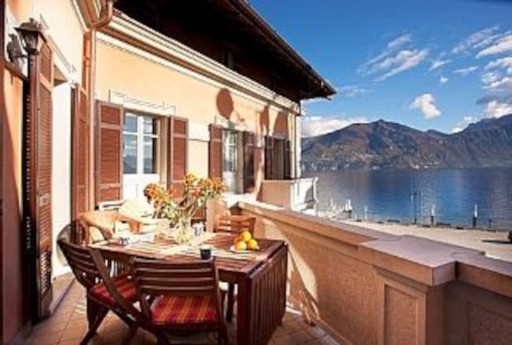 Breakfast on the balcony with the lake and mountain back drop.