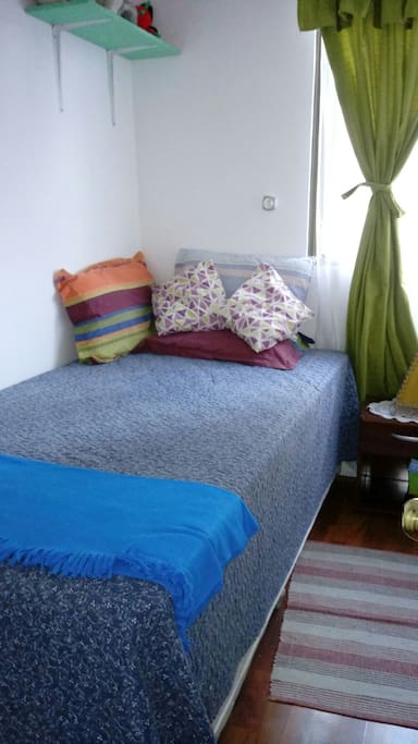 dormitorio cama plaza y media.