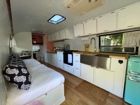 Top performing Airbnb: Cozy Camper + outdoor shower, fire pit & hottub! in East Forest Hills