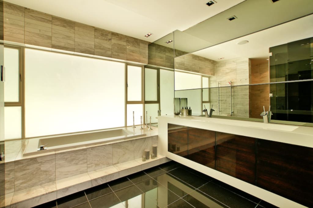 Bathroom with a tub and shower.