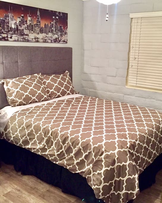 New queen size bed, desk and flooring.