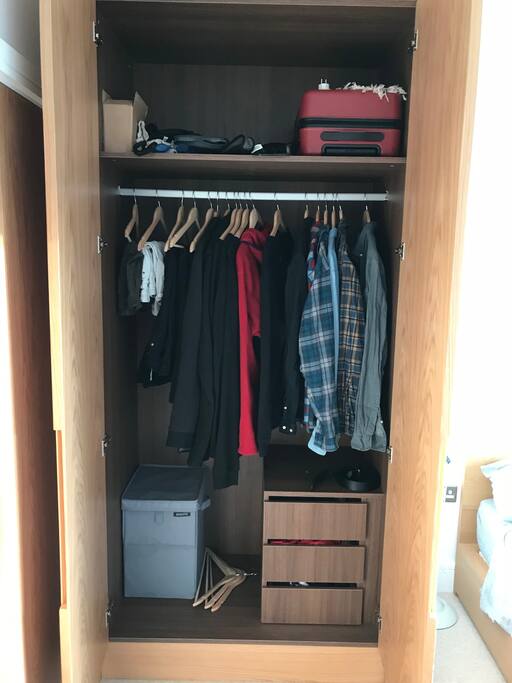 This wardrobe will be empty, for you to use for storing your clothes and things. It's really spacious.
