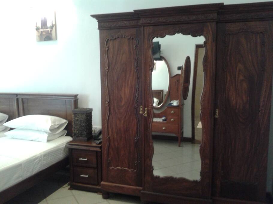 antique wardrobe and bedside tables