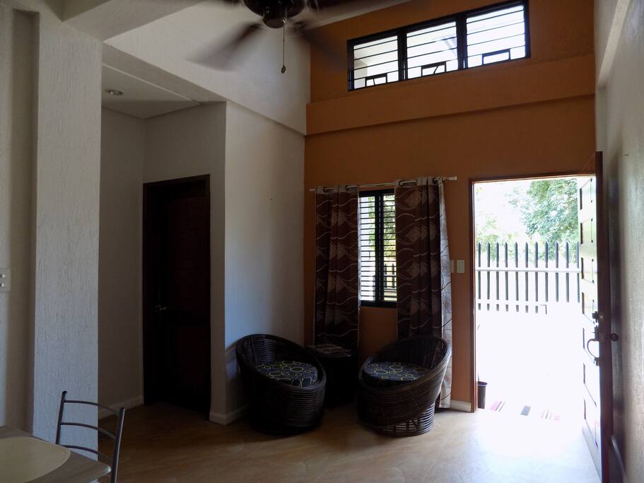living room with high ceiling
