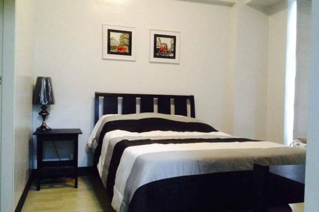Bedroom: (1) queen-size comfy REAL bed, (2) pull-out extra queen-size bed, (3) with side tables and night lamps